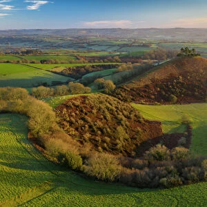 Aerial view of Colmers Hill at dawn on a sunny winter morning, Symondsbury, Dorset, England, United Kingdom, Europe