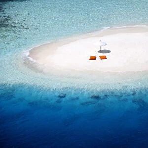 Aerial view of a sandbank, pillows and sun umbrella, Maldives, Indian Ocean, Asia