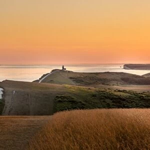 Beachy Head and the Belle Tout lighthouse at dusk, near Eastbourne, East Sussex, England, United Kingdom, Europe