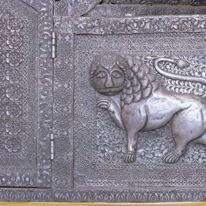 Beautiful raised silver work on panel on the side of