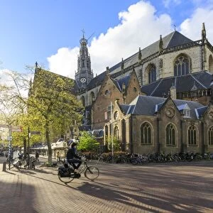 Bicycles in the pedestrian square next to the ancient church Grote Kerk, Haarlem