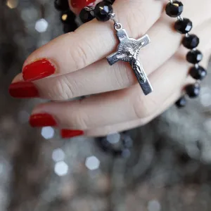 Catholic woman praying rosary beads and crucifix, Vietnam, Indochina, Southeast Asia