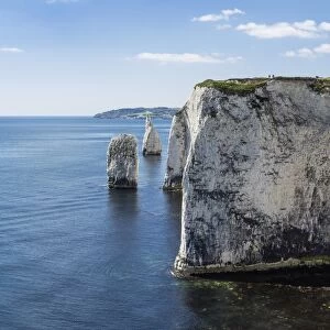 The Chalk cliffs of Ballard Down with The Pinnacles Stack and Stump in Swanage Bay