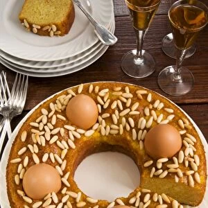 Ciambella marchigiana, a ring cake with pinenut filling and eggs, a traditional Italian cake for Easter, Marche