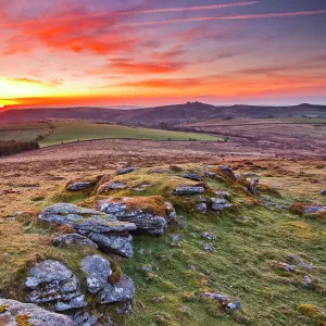 A colourful dawn on Chinkwell Tor in Dartmoor National Park, Devon, England, United Kingdom, Europe