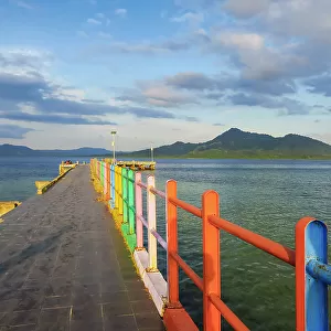 The colourful jetty at this popular coral fringed holiday island and scuba diving destination, Bunaken Island, Sulawesi, Indonesia, Southeast Asia, Asia