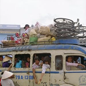 Crowded bus with bicycles