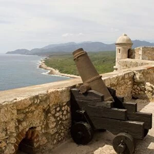 Cuban coastline and the Castillo del Morro, a fortess at the entrance to the Bay of Santiago