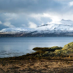 Cuillin Mountain range in the snow from Ord Beach, Isle of Skye, Inner Hebrides, Scotland