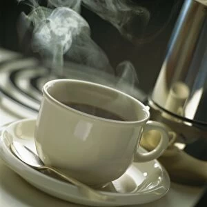 Cup of steaming coffee