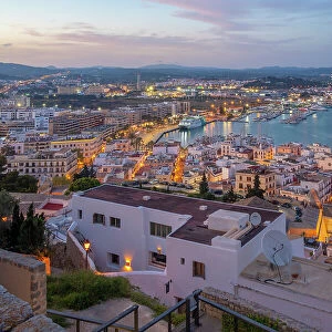Elevated view of Dalt Vila district at dusk, UNESCO World Heritage Site, Ibiza Town, Eivissa, Balearic Islands, Spain, Mediterranean, Europe