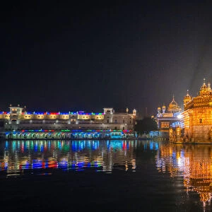 The Golden Temple at night during a celebration, Amritsar, Punjab, India, Asia