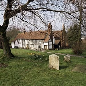 Half timbered cottages in the church graveyard at Old Hatfield, Hertfordshire