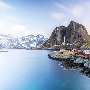 High angle view of traditional red Rorbu cabins in the fishing village of Hamnoy at dawn, Reine, Lofoten Islands, Norway, Europe