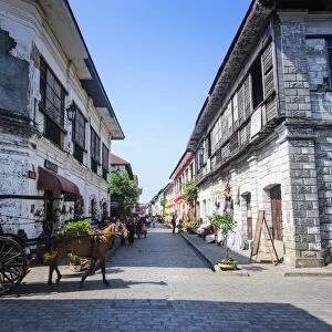 Horse cart riding through the Spanish colonial architecture in Vigan, UNESCO World Heritage Site, Northern Luzon, Philippines, Southeast Asia, Asia