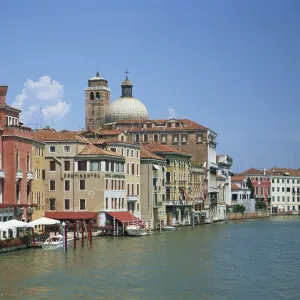 Houses and cafes on the Grand Canal and San Geremia church