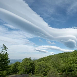 Long lenticular clouds in a mountain landscape, Emilia Romagna, Italy, Europe