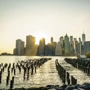 Lower Manhattan skyline across the East River at sunset, New York City, New York