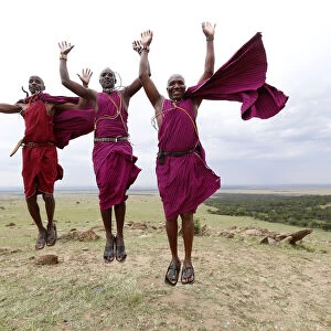 Masai warriors doing the traditional jump dance, Masai Mara Game Reserve, Kenya