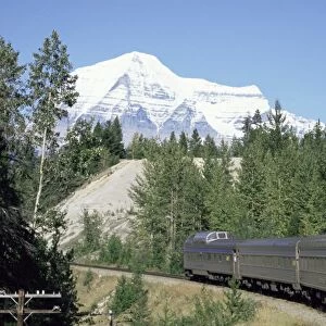 Mount Robson, highest peak in Canadian Rockies, 3964m, seen from Canadian transcontinental express between Jasper and Vancouver, British Columbia, Canada