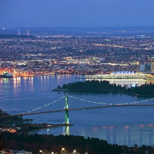Night view of city skyline and Lions Gate Bridge, from Cypress Provincial Park