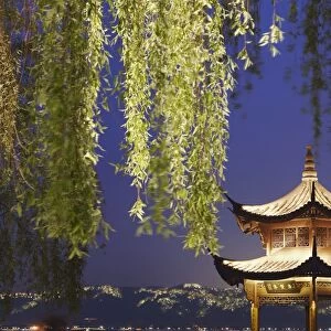Pavilion on Xi Hu (West Lake) at dusk, Hangzhou, Zhejiang, China, Asia