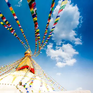 Prayer flags and Buddhist stupa at Bouddha (Boudhanath), UNESCO World Heritage Site