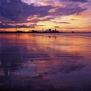 Redcar Beach at sunset with steelworks in the background, Redcar, Cleveland