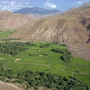Rice fields and terracing in a valley in the Shahrak region