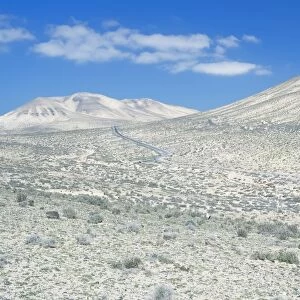 Road winding through the volcanic hills of Jandia Peninsula, Fuerteventura