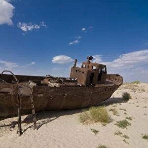 Rusting boats lying in the desert which used to be the Aral Sea, Moynaq