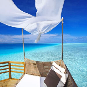 Sofa on tropical beach, Maldives, Indian Ocean, Asia