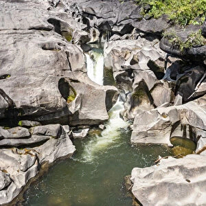 Stone outcrops forming rock formations, Vale da Lua, Chapada dos Veadeiros National Park, UNESCO World Heritage Site, Goias, Brazil, South America