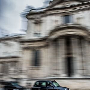 Taxi going past St. Pauls Cathedral, London, England, United Kingdom, Europe
