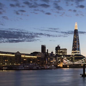 Tower Bridge and The Shard at sunset, taken from Wapping, London, England, United Kingdom