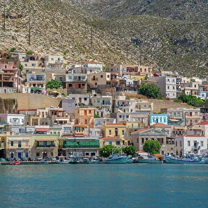 View of port and town of Kalimnos with hills in the background, Kalimnos, Dodecanese Islands, Greek Islands, Greece, Europe