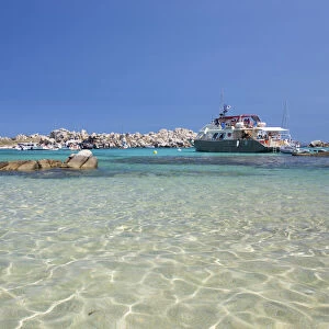 View across the shallow turquoise waters of Cala Lazarina, Lavezzu, Lavezzi Islands, Bonifacio, Corse-du-Sud, Corsica, France, Mediterranean, Europe