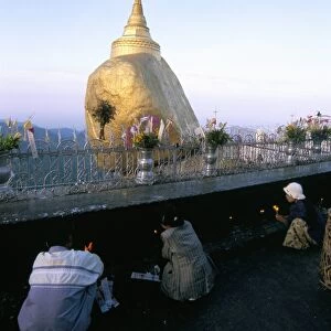 Worshippers praying at Kyaiktiyo Pagoda (Golden Rock Pagoda), Mon State