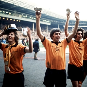 Wolverhampton Wanderers Celebrate League Cup Victory: Powell, Richards, Palmer Hold the Trophy
