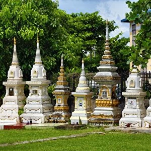 Graves in a cemetery at Wat Si Saket Buddhist Temple, Vientiane, Laos