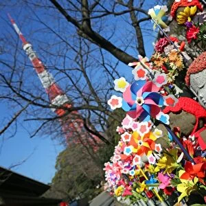 Jizo statues and windmills in the Zojoji Temple cemetery garden
