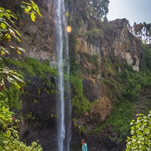 Africa, Uganda, Sipi Falls. Hiking to the upper falls