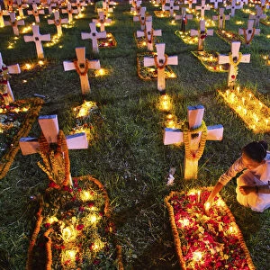 All Souls Day is a holy day set aside for honoring the dead, Dhaka, Bangladesh