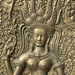 Cambodia, Phnom Penh, Wat Phnom, Wall Relief depicting Apsara Dancer
