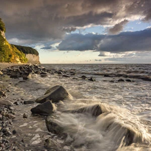 Chalk cliffs at the Baltic Sea in the dramatic morning light, National Park Jasmund, Island Rugen, Mecklenburg-Western Pomerania, Germany, Europe
