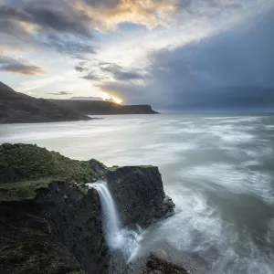 Coastal waterfall at sunrise, Isle of Purbeck, Jurassic Coast World Heritage Site, Dorset