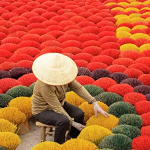 Colourful Incense sticks being dried, Quang Phu Cau village, Hanoi Province, Vietnam