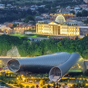 Concert Hall & Exhibition Center in Rike Park and Presidential Palace at night