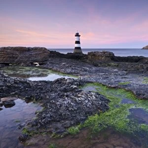 Dusk over Penmon Point Lighthouse and Puffin Island, Isle of Anglesey, Wales, UK. Spring