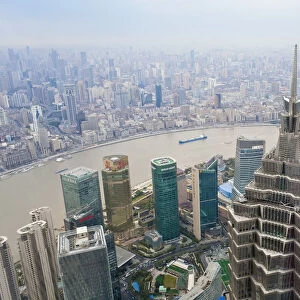 Futuristic Jinmao Tower overlooking the Huangpu river, Bund and Shanghai City, Shanghai